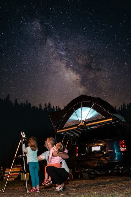 Family doing stargazing 