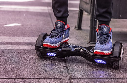 A person riding a hoverboard